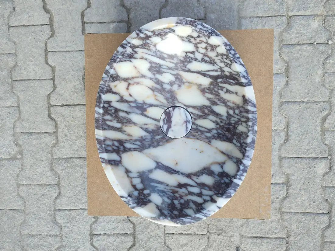 Calacatta Viola marble oval bathroom sink with purple-gray veining