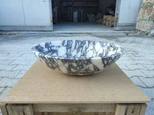 Calacatta Viola marble oval bathroom sink by Villohome; white with dark gray veining.