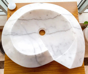 Carrara marble helix vanity sink, above vanity, polished white with gray veining