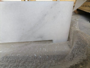 Carrara white marble wall-mount bathroom sink with ribbed texture