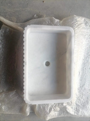 Carrara white marble wall-mount bathroom sink by Villohome with ribbed scalloped edge