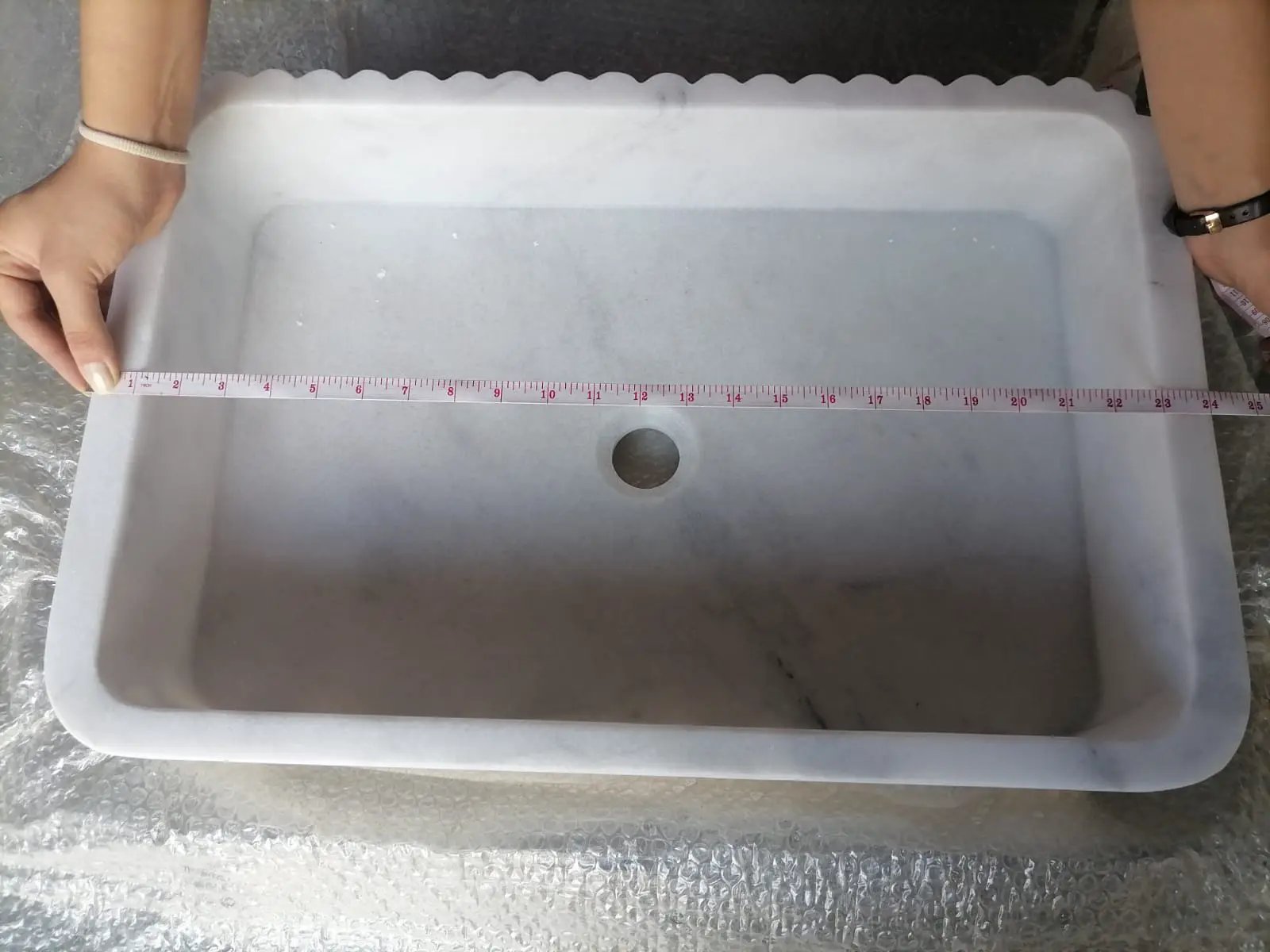Villohome Carrara white marble wall-mount bathroom sink, 24-inch wide, ribbed textured surface with central drain hole