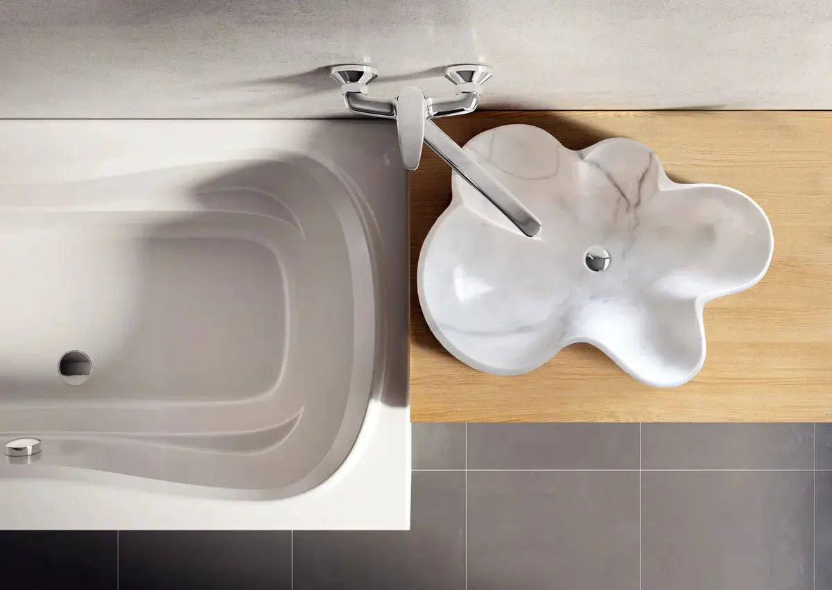 Bathroom sink in Carrara white marble, above-vanity design, polished natural stone by Villohome.