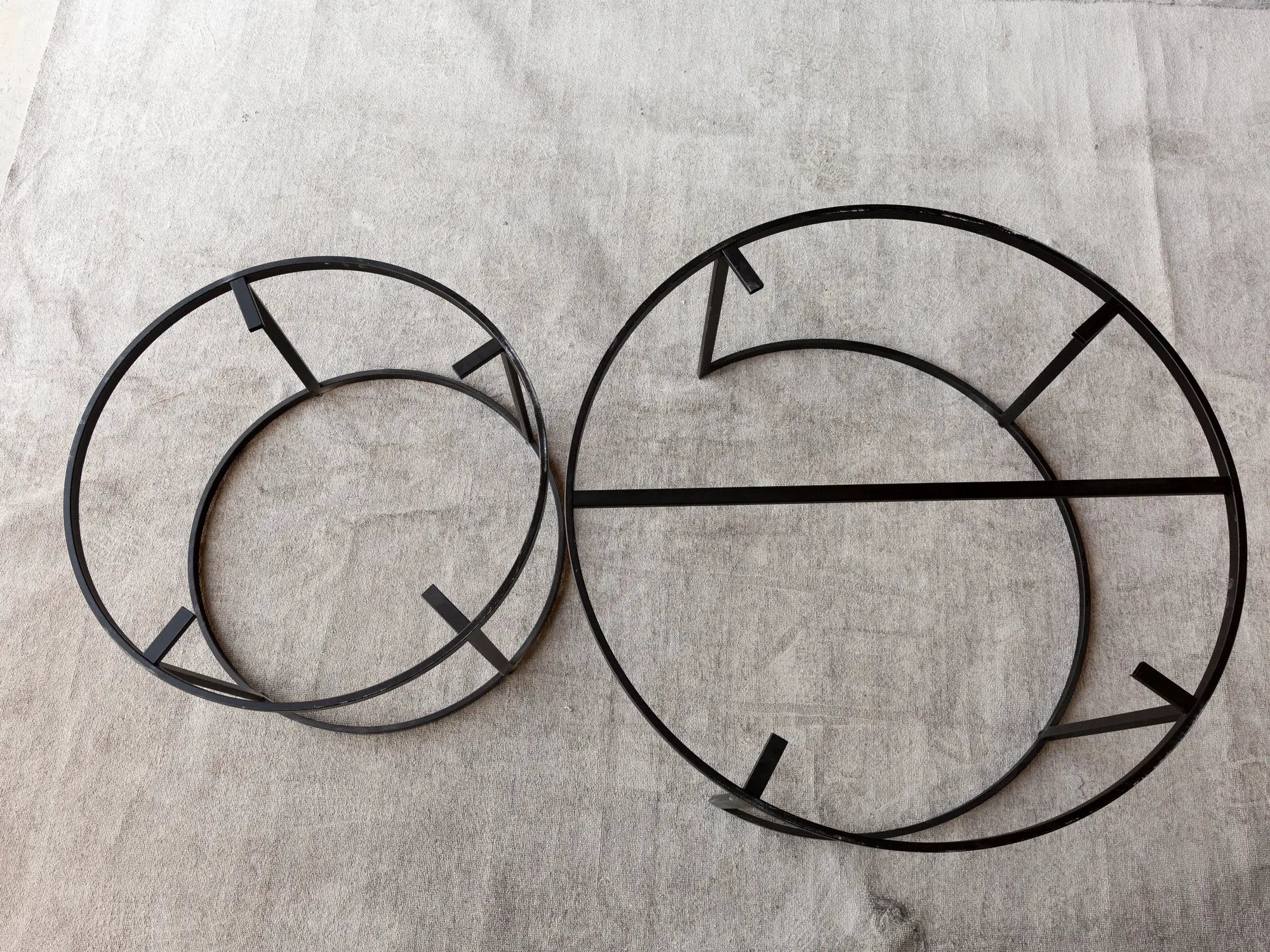Villohome round nesting coffee tables, set of 2, black metal frames on a light rug