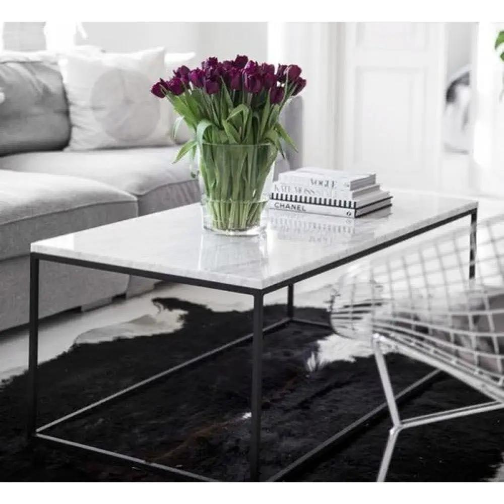 Marble coffee table with rectangular polished top and eased edge, black metal frame