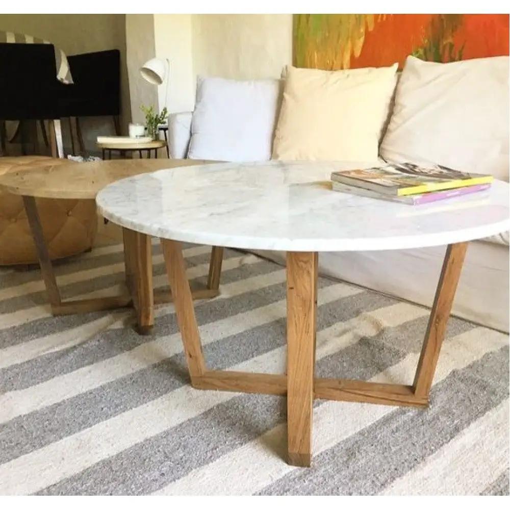 Villohome Carrara White Marble round coffee table with polished eased edge and wooden legs; two tables shown.