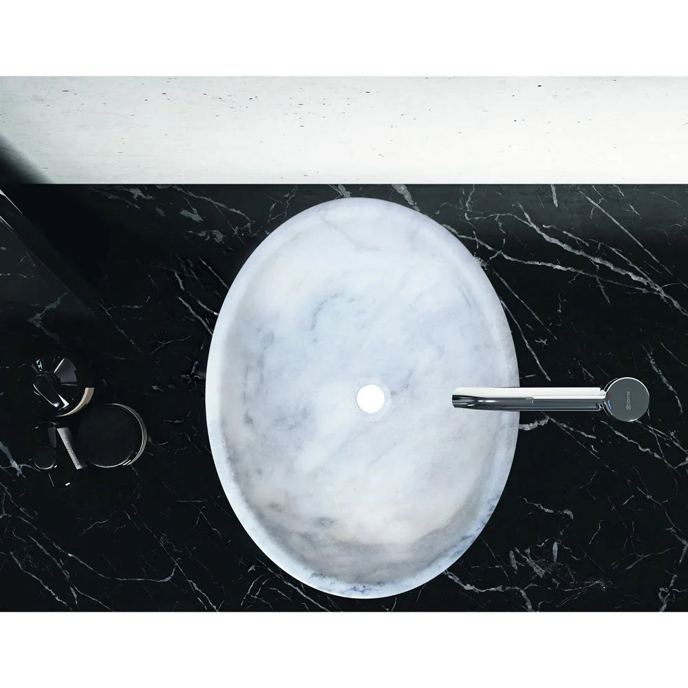 Villohome Carrara White Marble oval vessel sink on black marble countertop with chrome faucet