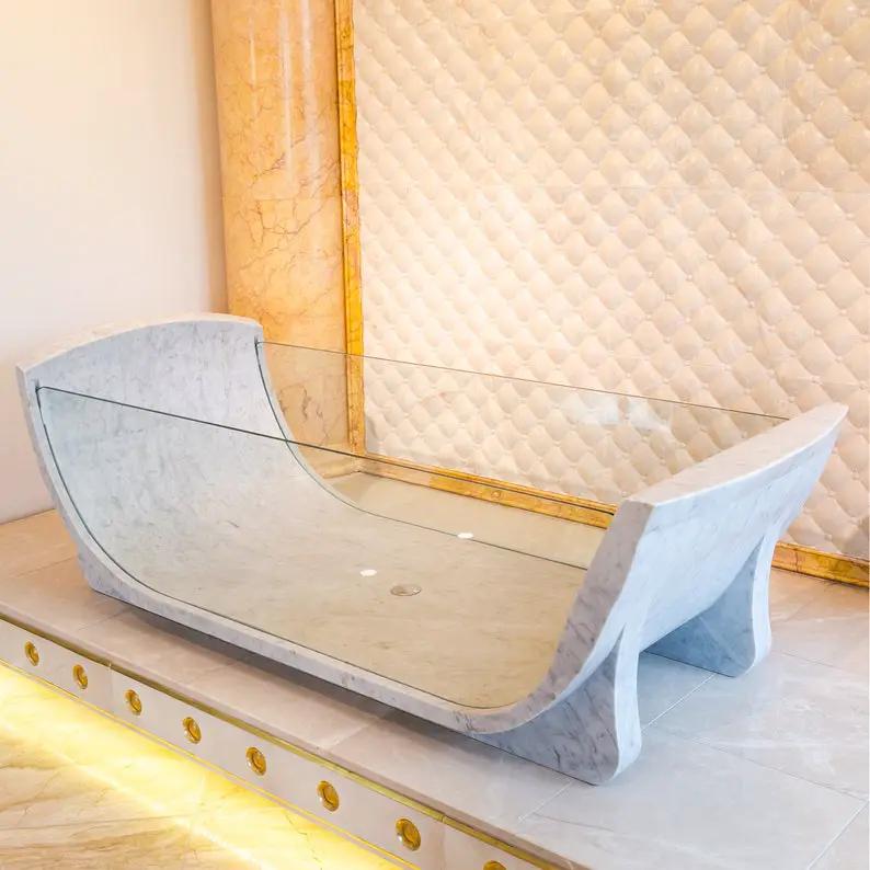 Carrara White Marble Bathtub with tempered glass side walls by Villohome.