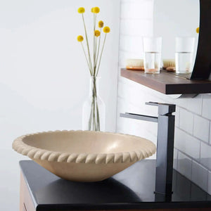 Villohome Champagne Limestone Oval bathroom sink, self-rimming vessel on dark wood vanity