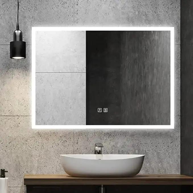 HAUSVITA Compact Edge Glow LED bathroom mirror with edge-lit frame above a wooden vanity