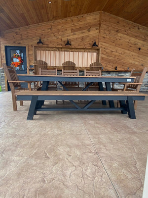 Harmony Outdoor Table by Wooden Whale Workshop; dark blue frame with natural wood top, outdoor dining set with several chairs