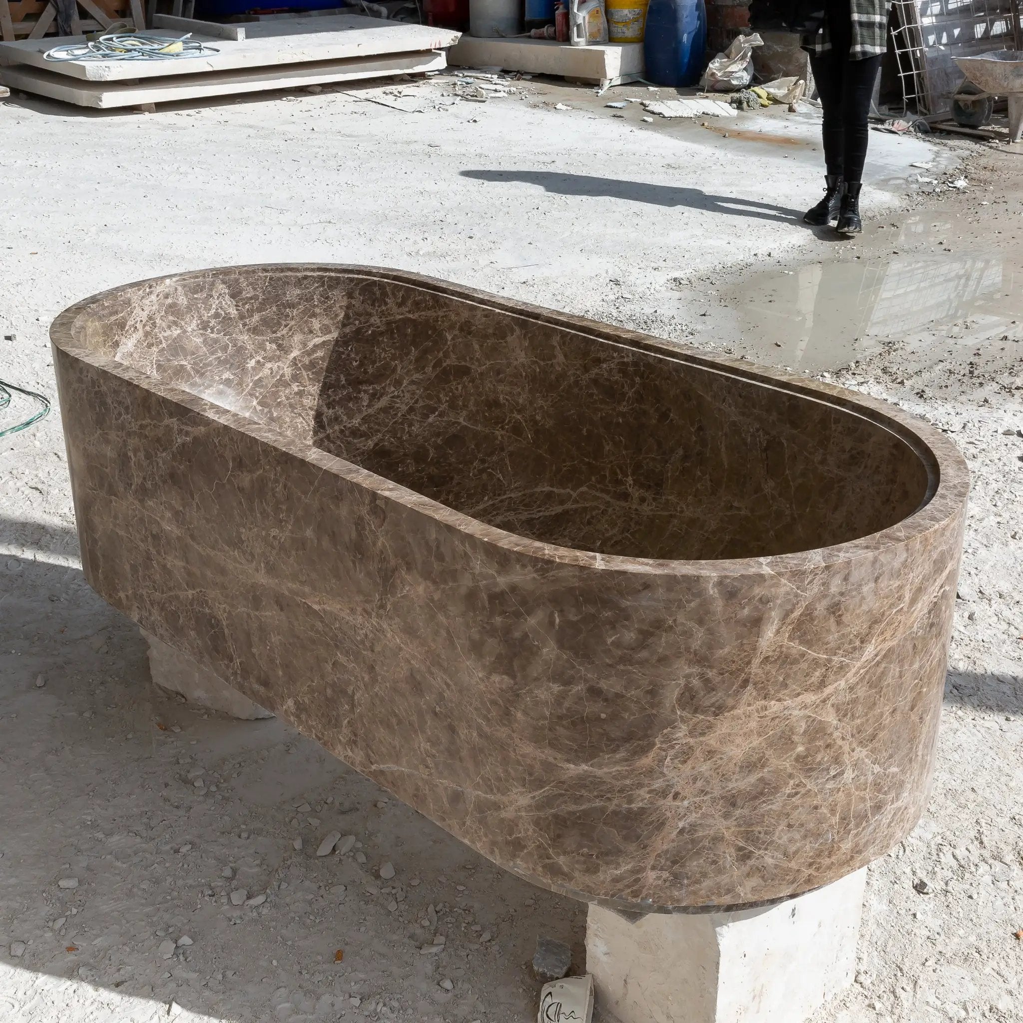 Emperador Light marble bathtub by Villohome, hand-carved solid marble with brown veining