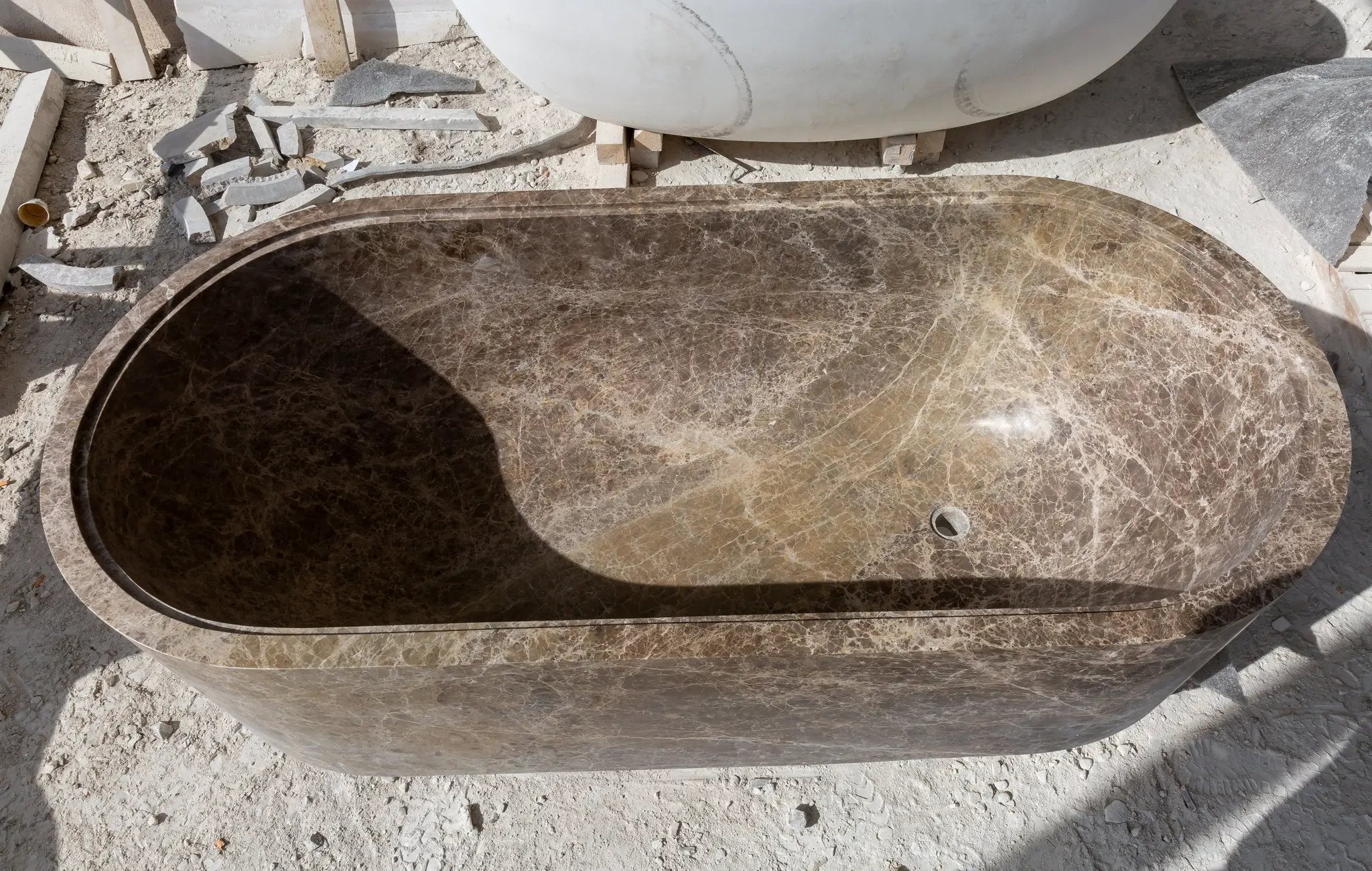 Emperador Light marble bathtub, brown marble with white veining, oval shape