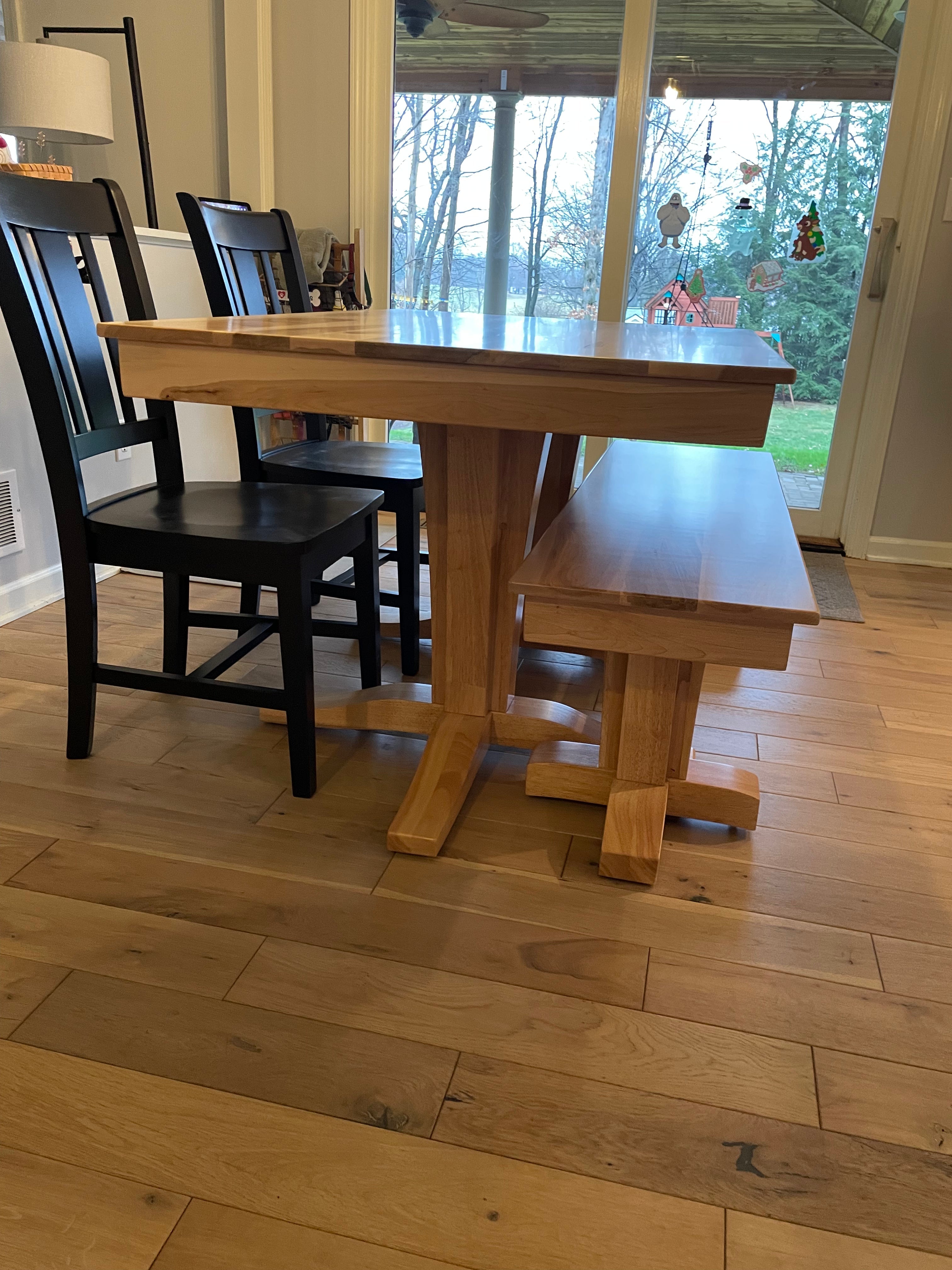 Terresa Style Leg Bench by Wooden Whale Workshop, natural wood finish, with two black dining chairs