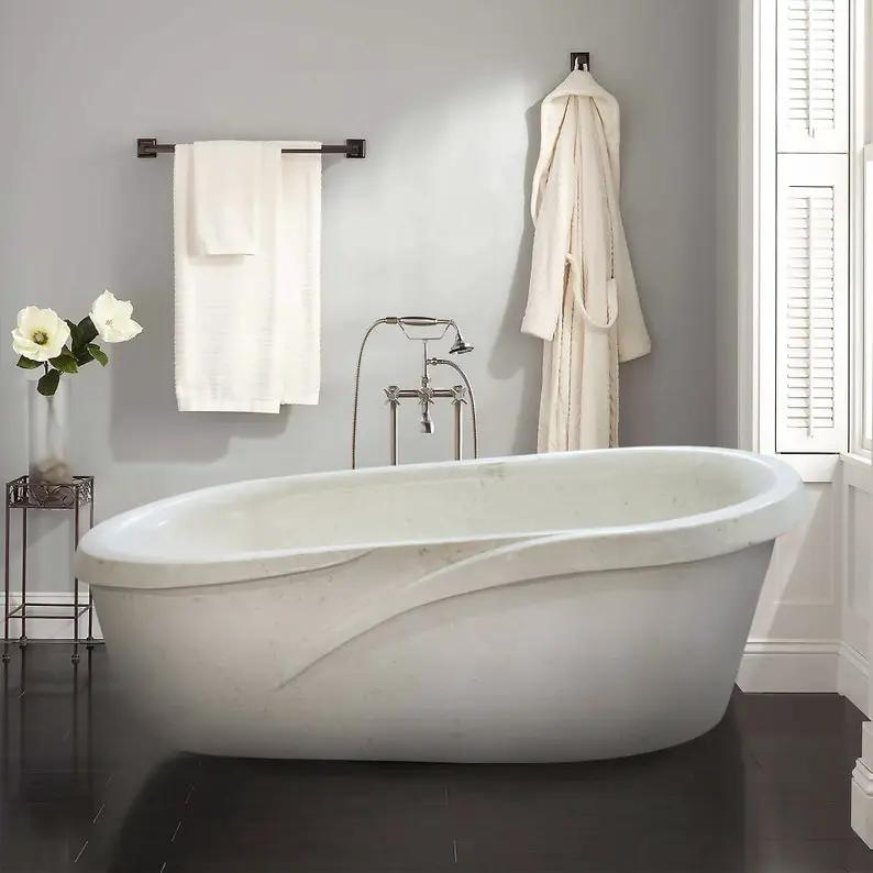 Fossil white limestone sloped bathtub, hand-carved from solid marble block, polished finish, freestanding oval tub.