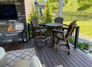 Round outdoor counter-height table with four brown wooden chairs on a deck; Wooden Whale Workshop