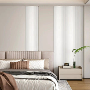 Hausvita WPC Slat Wall Panel, 48 x 6 in, 16-pack, white vertical slats on beige wall.