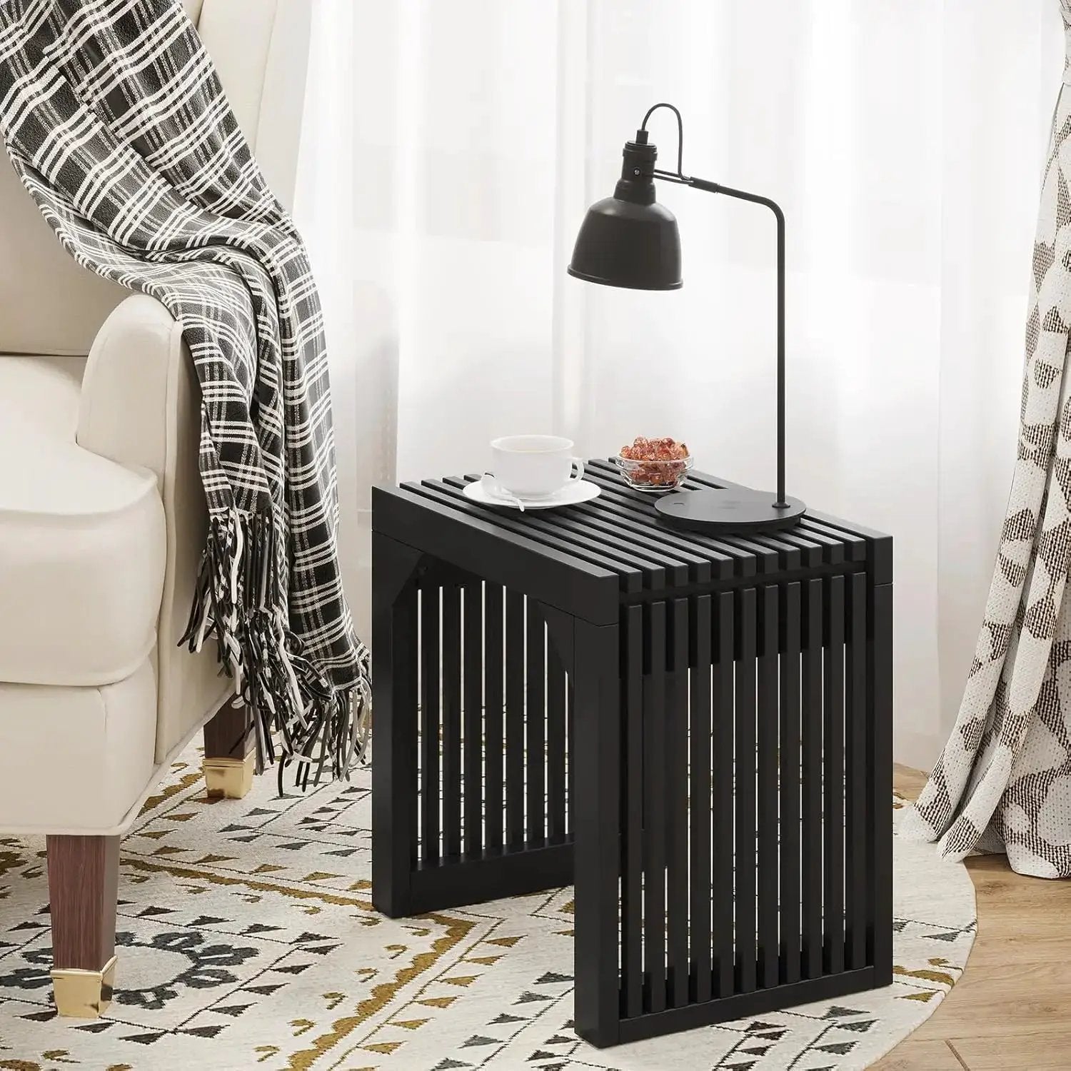 Hausvita 35-inch black slatted wooden dining bench with grille-style sides for indoor use.