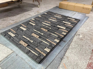 Hausvita PU stone veneer wall panel in charcoal gray with beige accents, 46.46in x 13in.