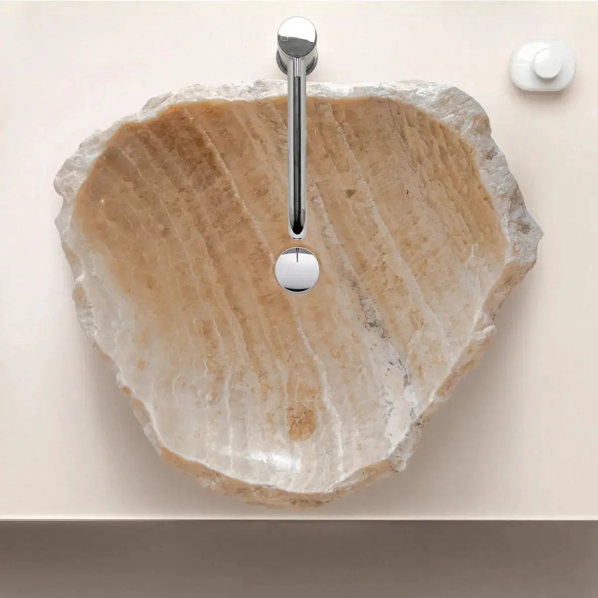Honey Onyx translucent rustic stone bathroom sink by Villohome with chrome faucet