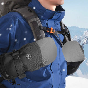 LITEGUEST Heated Gloves, gray insulated gloves with a visible power button, worn by a hiker in a blue jacket.