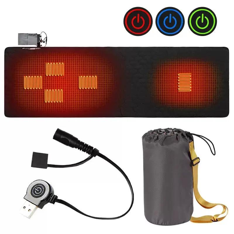 LITEGUEST USB heated sleeping mat in black with orange heat zones; includes controller, power adapter, and carry bag.