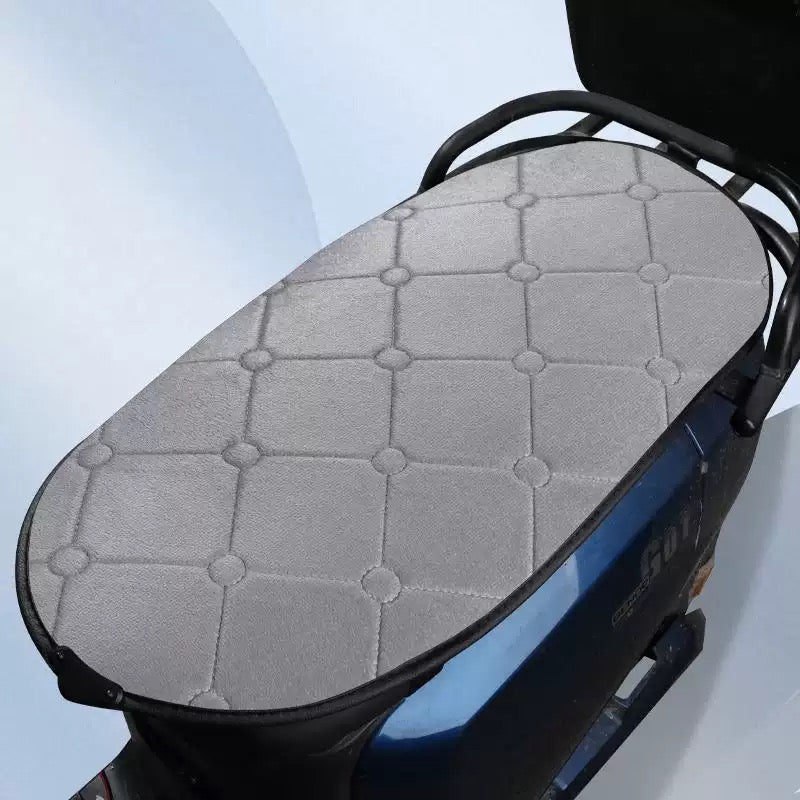 LITEGUEST heated motorcycle seat cover on blue scooter, quilted gray top with circular stitch pattern