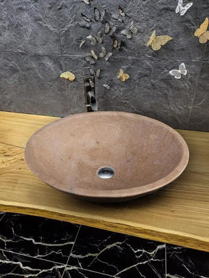 Stone sink Karina Walnut Travertine oval bathroom vessel sink by Villohome on a wood vanity