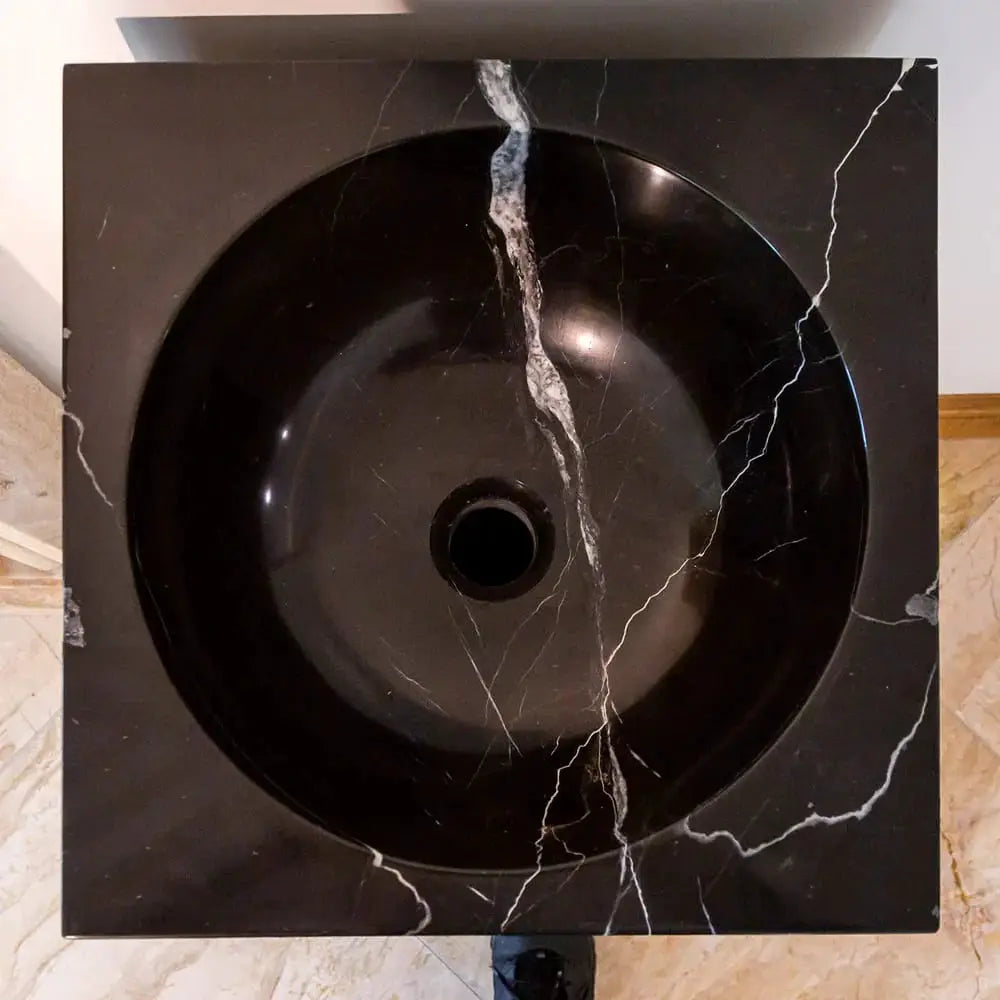 Natural stone round black marble sink with white veins on black Carrara marble top