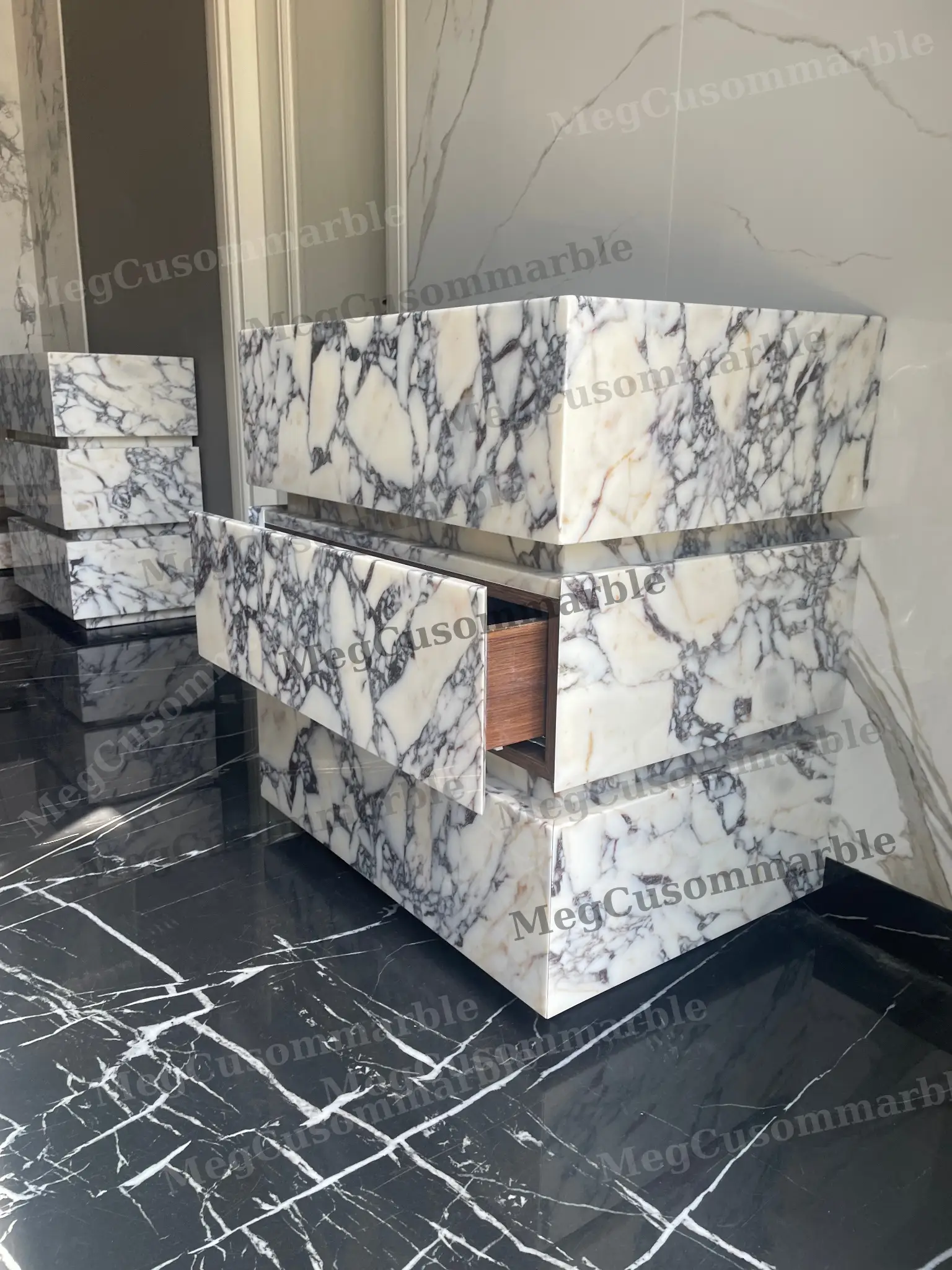 Made-to-order freestanding vanity unit in Calacatta Viola marble with purple/gray veins by MegCustom Marble