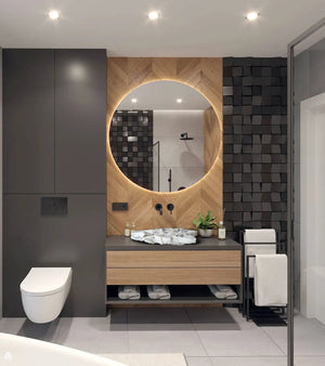 Calacatta Viola marble leaf vanity sink on a wooden vanity with round backlit mirror