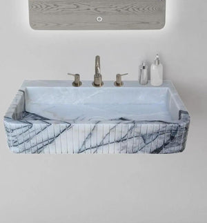 New York Marble wall-mount bathroom sink with fluted front and edges in blue-gray marble
