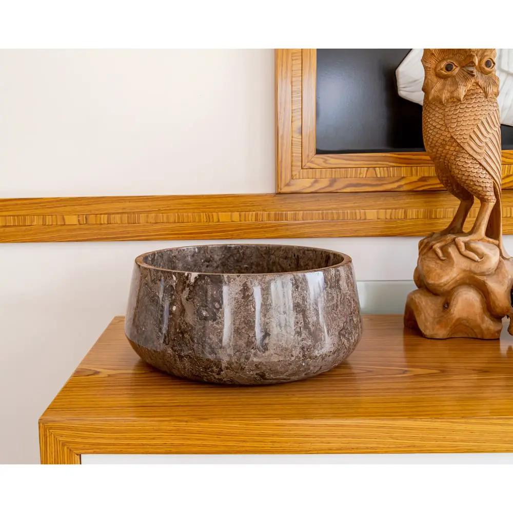 Narcist brown marble vessel sink, high-gloss polished, 16" diameter, 6.5" high on a wooden surface.