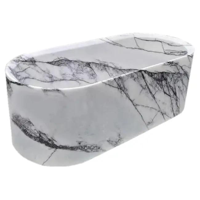 New York Marble Bathtub by Villohome; hand-carved white marble with black veining