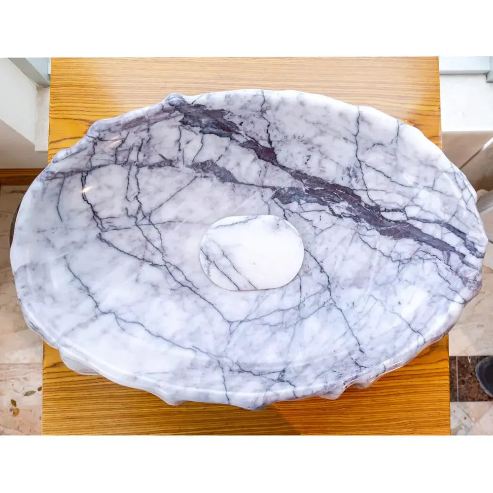 New York Marble Designer Vessel Sink by Villohome; polished white marble with gray veining