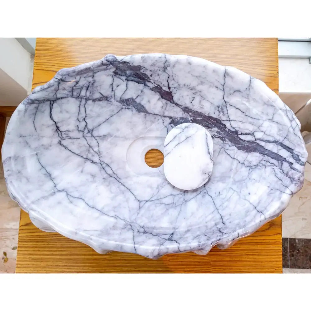 New York Marble designer bathroom vessel sink by Villohome, polished white marble with dark gray veining.