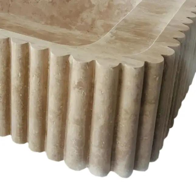 Oasis beige travertine wall-mount bathroom vanity sink with fluted edge by Villohome