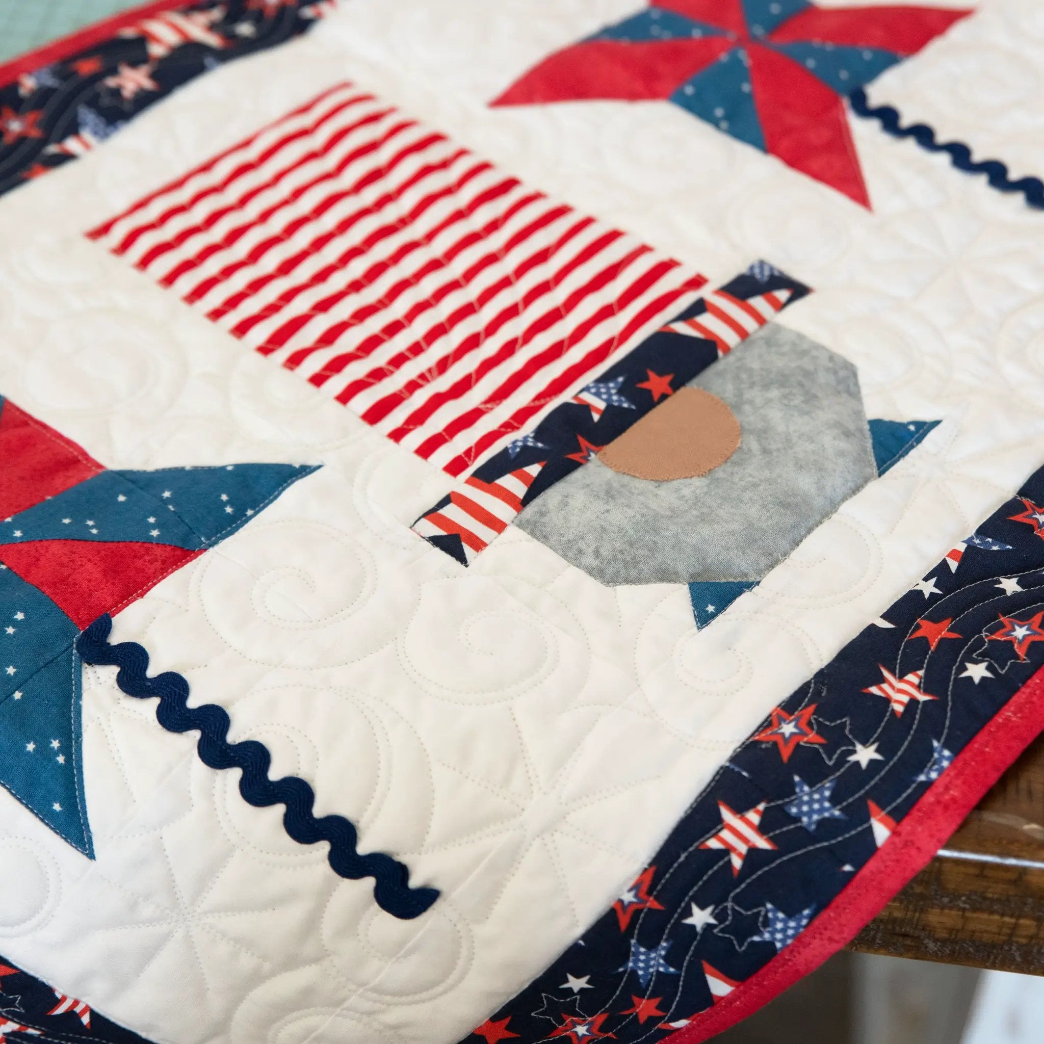 Quilt Kit: Patriotic Gnomes Table Runner precut by Block Party Quilt Co in red, white, blue fabrics.