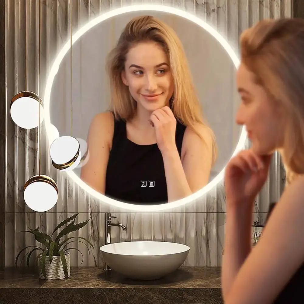 Round backlit LED bathroom vanity mirror by HAUSVITA with dimmable lights.