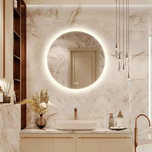 HAUSVITA Round LED bathroom vanity mirror with dimmable lights, wall-mounted over marble vanity.