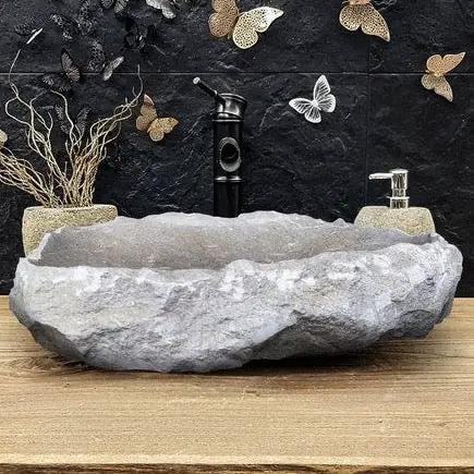 Seagrass fossil limestone bathroom vessel sink by Villohome, gray stone with polished interior and rustic exterior