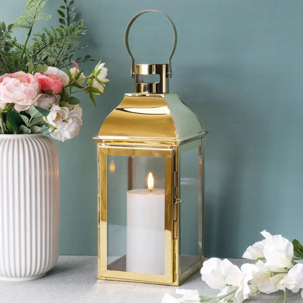 Decorative candle lantern, gold stainless steel with glass panels, 12.5" tall by JHY DESIGN.