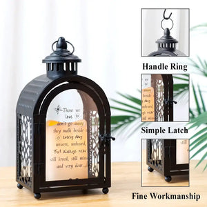 11-inch high memorial lantern, black decorative candle lantern with glass panels and ornate lattice sides.