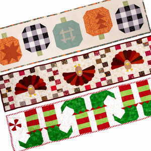 Holiday Quilted Table Runner Kit Bundle with pumpkin and patchwork blocks in teal and orange; festive border.