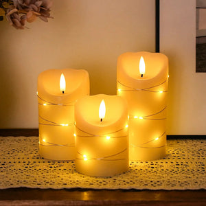 Set of 3 flickering flameless real-wax LED candles by JHY DESIGN, warm amber glow