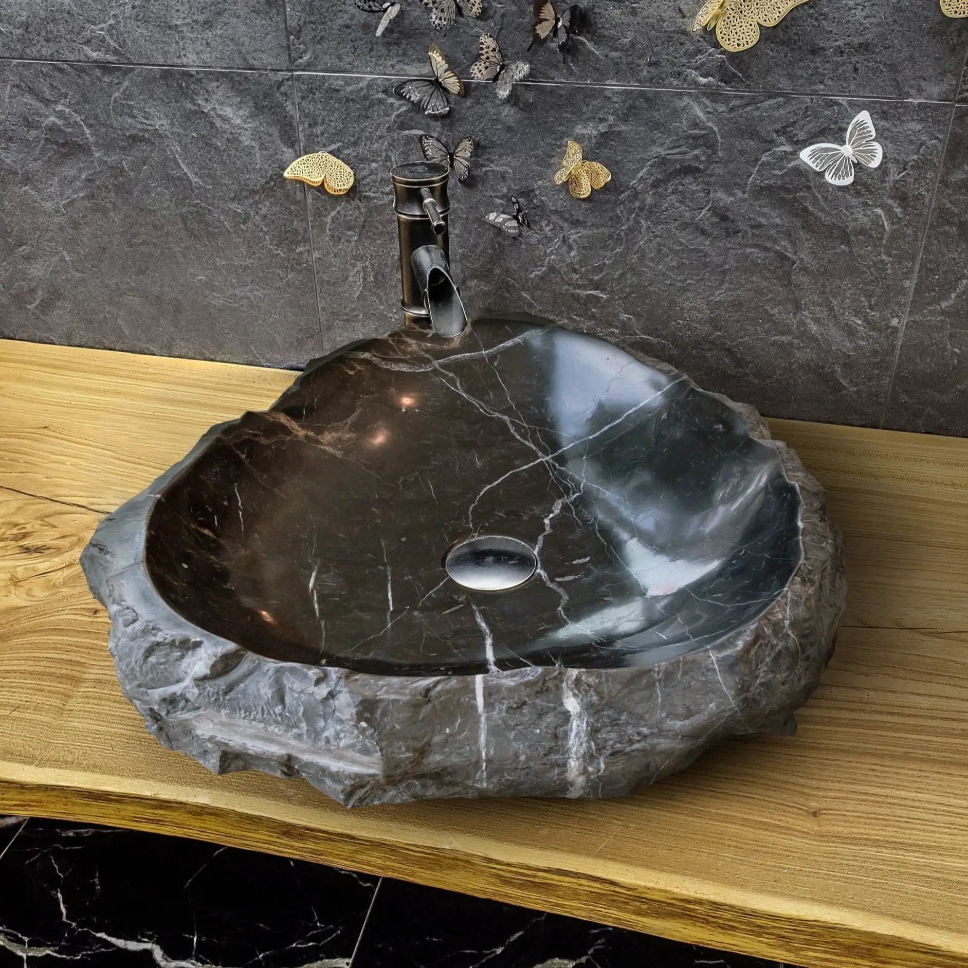 Toros Black natural stone marble rustic above-vanity bathroom sink; black marble basin with white veining on rugged stone base
