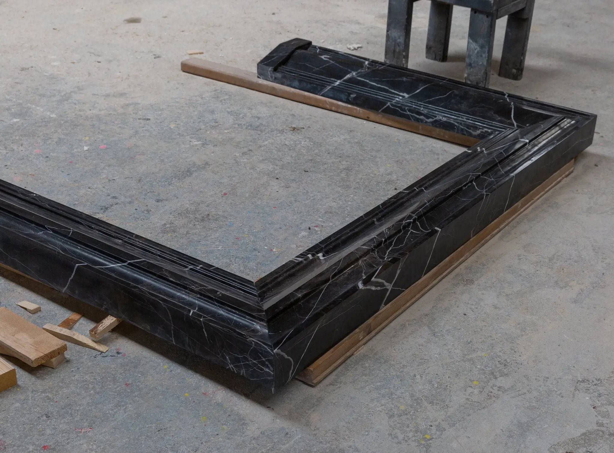 Toros Black Marble fireplace mantel by Villohome, polished hand-carved.