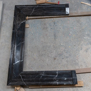 Toros Black Marble Hand-carved Fireplace Mantel, polished finish, 49x69 in, laid out in workshop