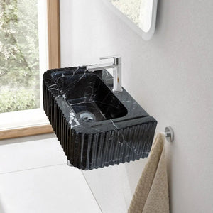 Toros black marble rectangular wall-mount bathroom sink with chrome faucet.