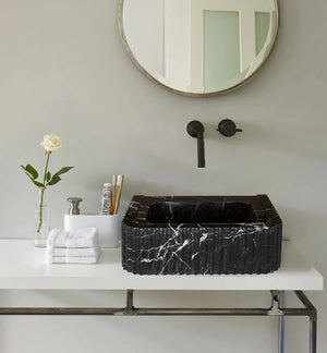 Toros black marble rectangular wall-mount bathroom sink with white veining.